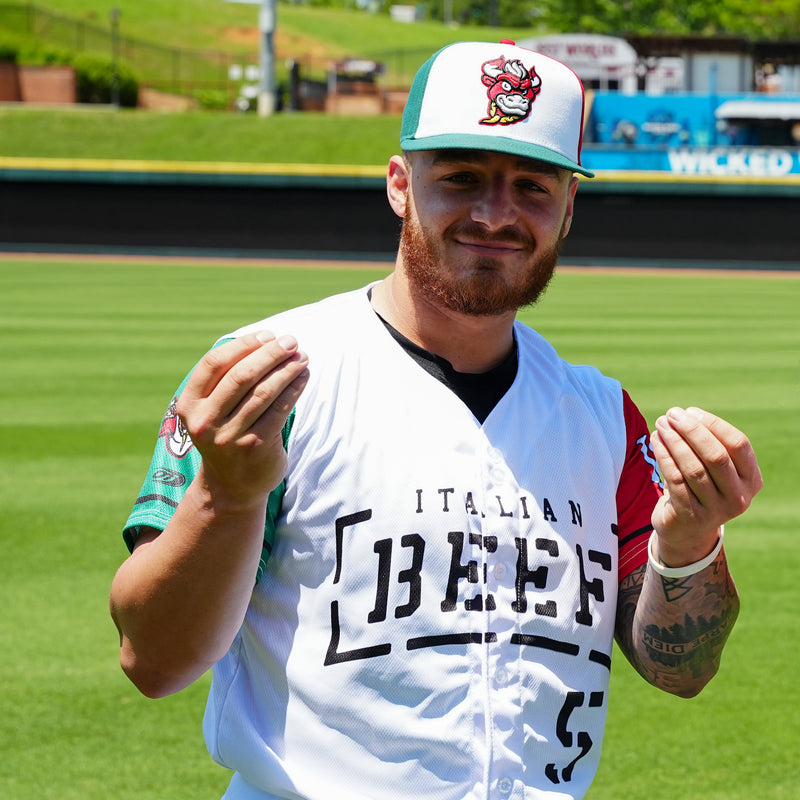 White Sox prospect Mario Camilletti models the Winston-Salem Dash Italian Beef jersey